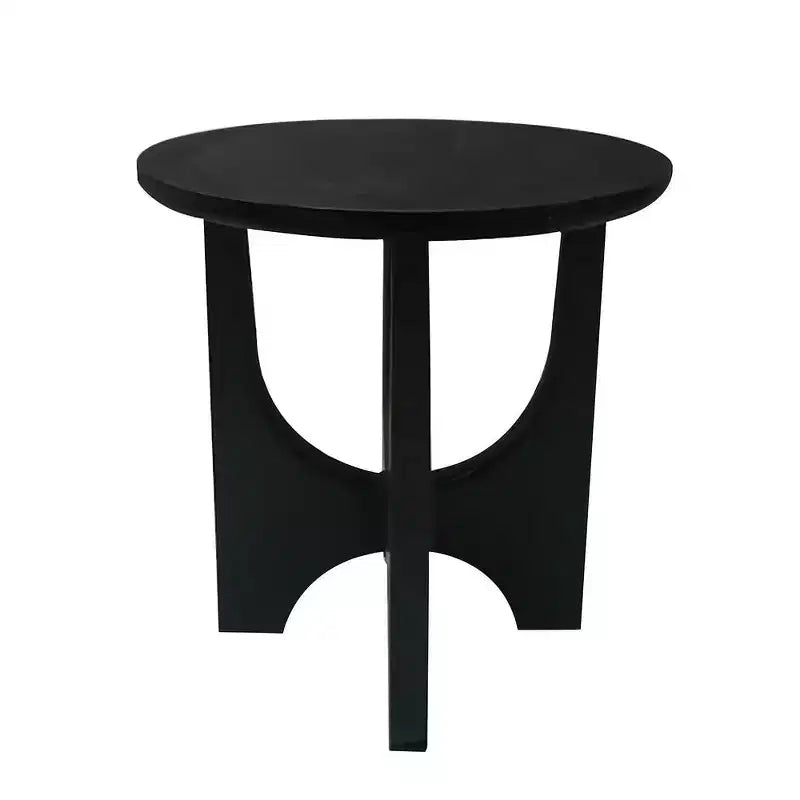 Round side table/coffee table featuring a 20-inch matte black solid mango wood tabletop and curved legs.