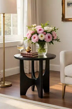 Table d'appoint/table basse ronde avec plateau en manguier massif noir mat de 20 pouces et pieds incurvés.