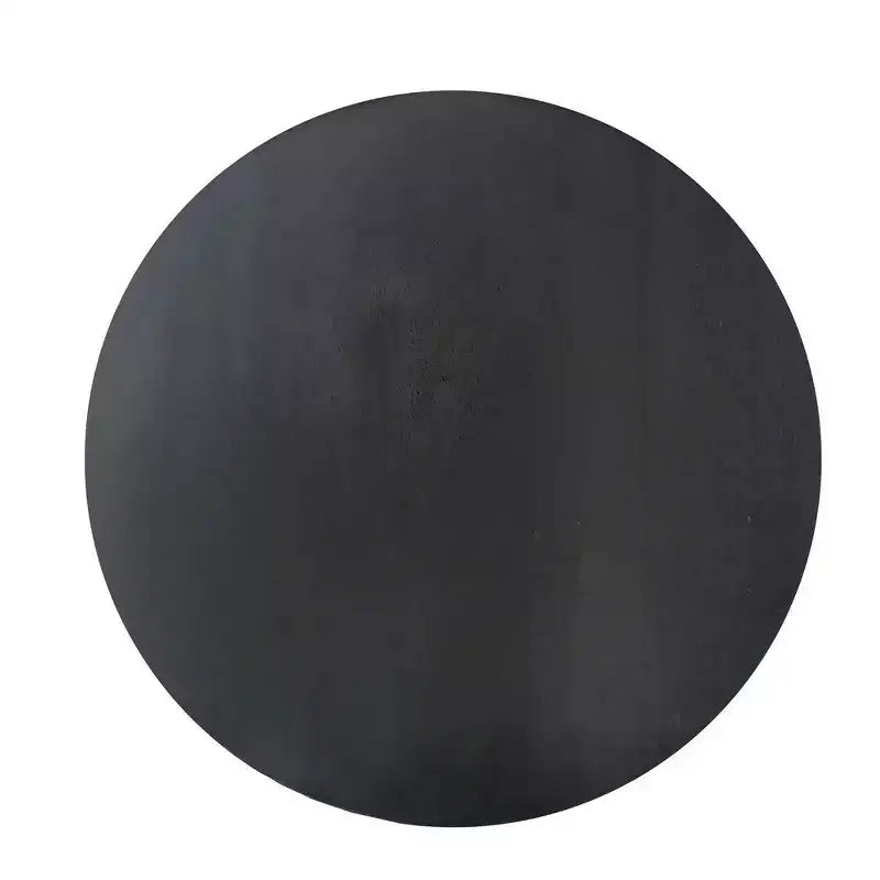 Round side table/coffee table featuring a 20-inch matte black solid mango wood tabletop and curved legs.